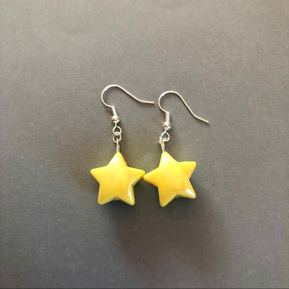 Yellow color shift star earrings